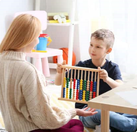Child with therapist working on skills